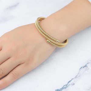 Muelle Dorada Élite